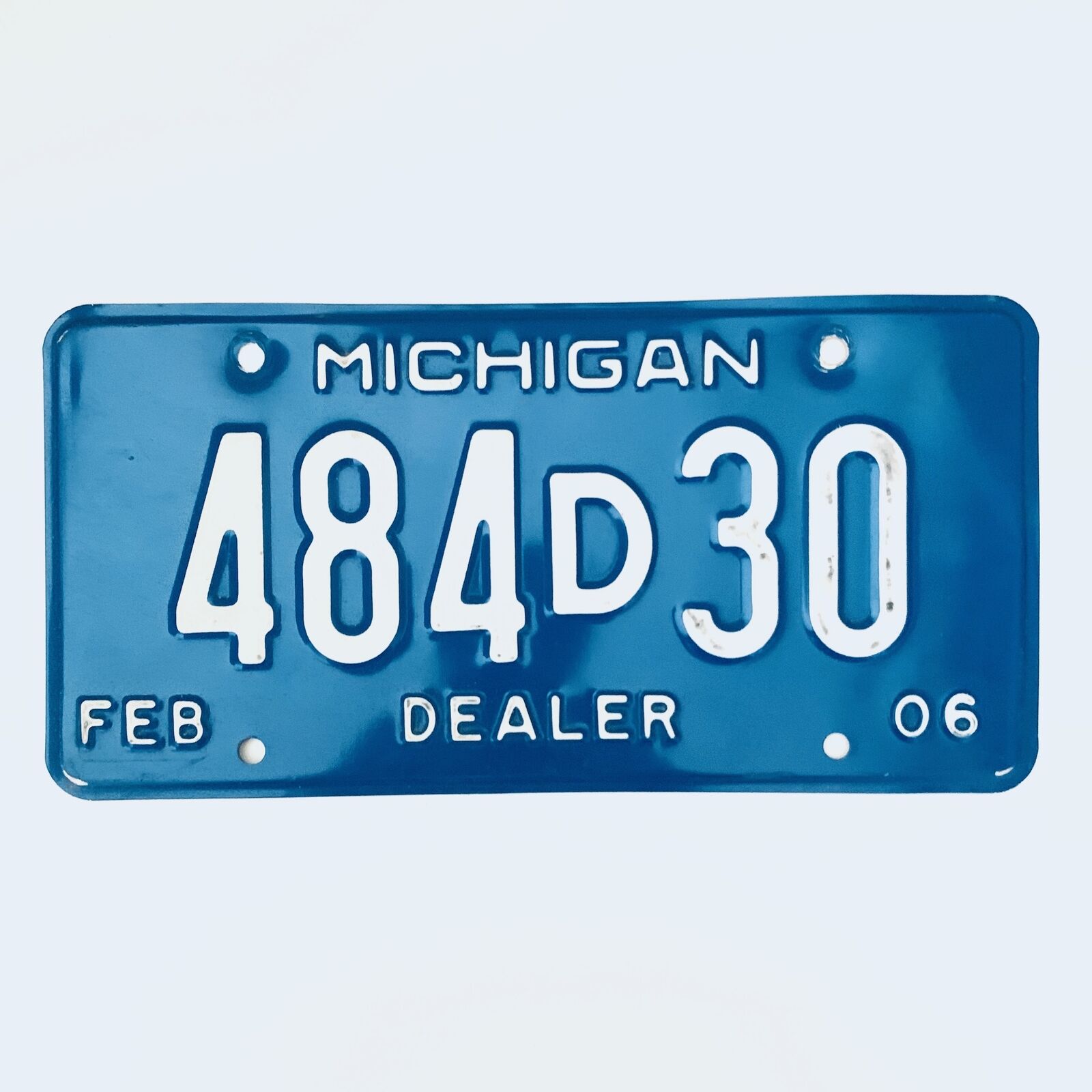 2006 United States Michigan Base Dealer License Plate 484d30